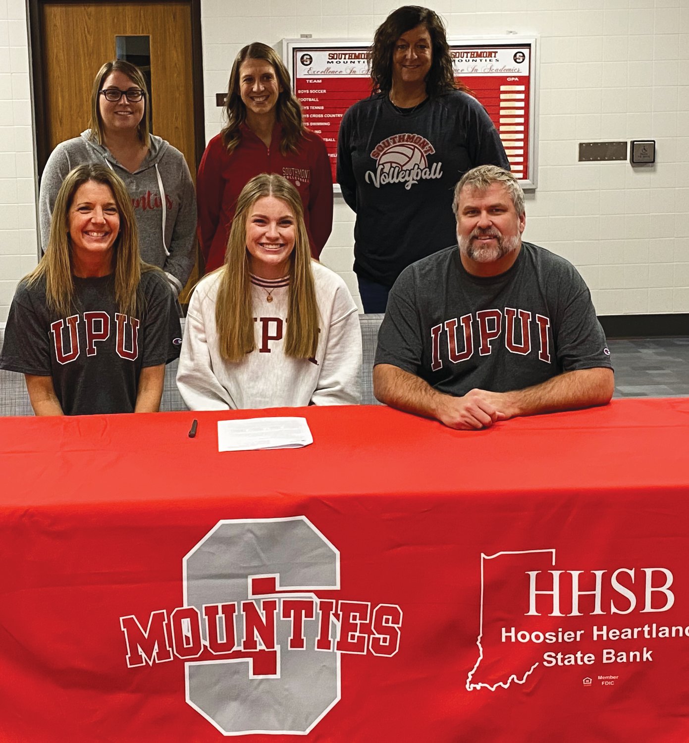 Sidney Veatch will continue her volleyball career at IUPUI. The Southmont senior is joined by her parents, Jenny and Tim Veatch, and Southmont coaches Erin Berry, Lauran Nichols, and Casey Harvey.