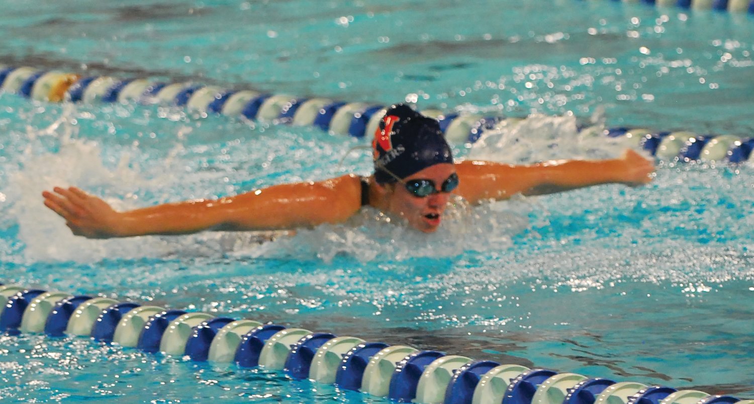 North Montgomery's Sidney Campbell swims to a win in the 100 butterfly. The senior also set a school record with a win in the 200 freestyle.
