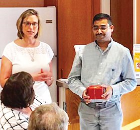 Dr. Dayanand Kiran, right, is pictured with Montgomery County Free Clinic director Kay Nannet in 2018. The clinic presented Kiran with a Golden Apple award for his volunteer service.