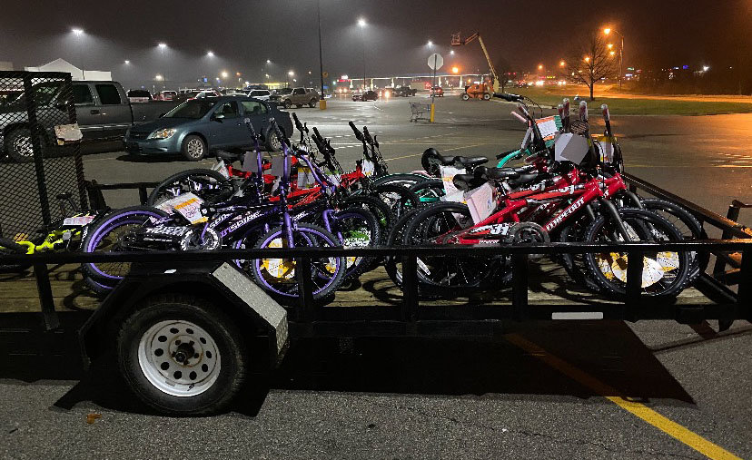 Bicycles to be distributed to local children in need sit on a trailer at Walmart. About 40 bikes were given to Montgomery County children in need in a project coordinated by local resident Steve Baldwin.