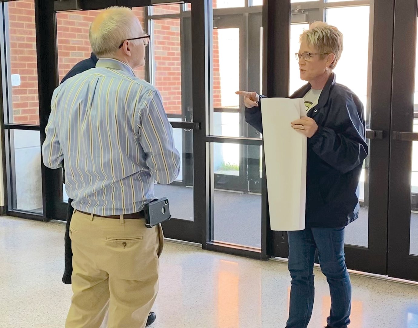 Montgomery County Health Department Administrator Amber Reed and Montgomery County Health Officer Dr. Scott Douglas talk through details of the drive-through testing site at Crawfordsville High School on Monday, March 30.