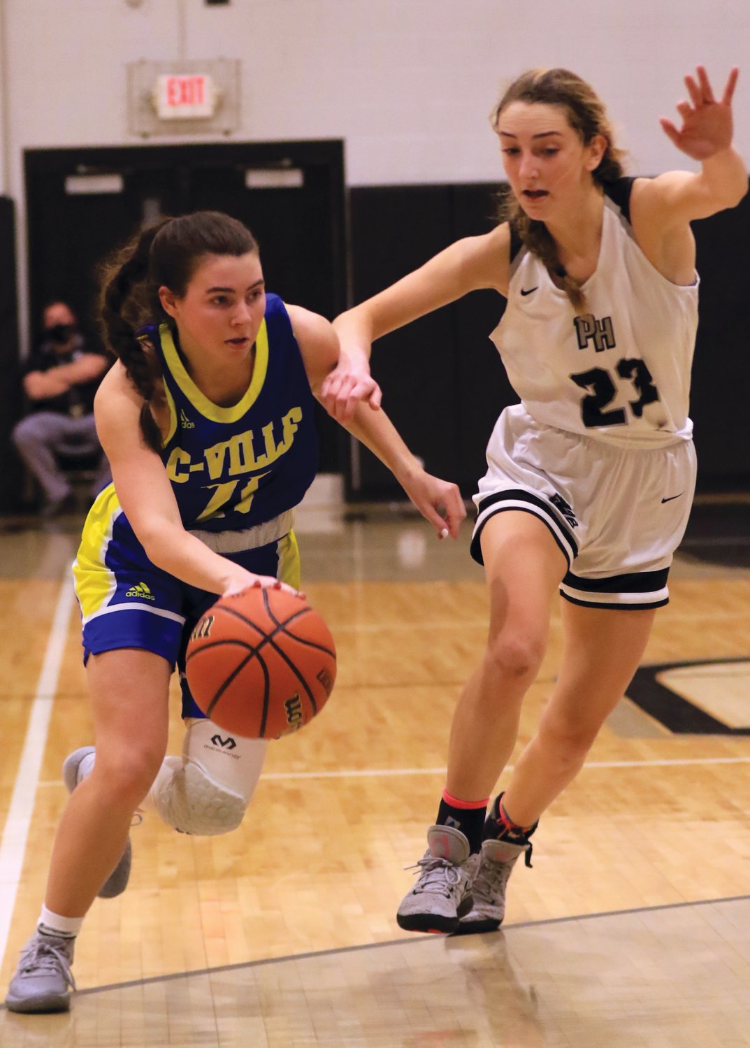 Crawfordsville's Liddy McCarty drives to the hoop against Parke Heritage on Saturday. The junior had five points in a 44-37 loss for the Athenians.