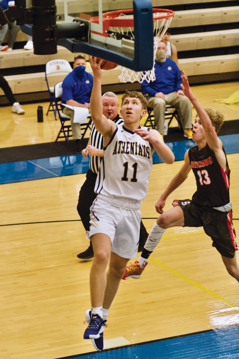 Crawfordsville's Ian Hensley scores a lay-up against Southmont in a game earlier this season.