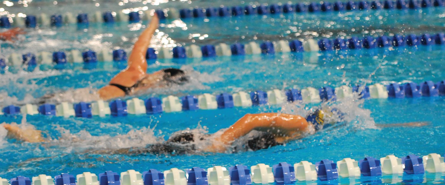 Crawfordsville's Alyx Bannon and North Montgomery's Sidney Campbell competes in the 100 freestyle. Bannon won the race, while Campbell took first in the 50 freestyle.