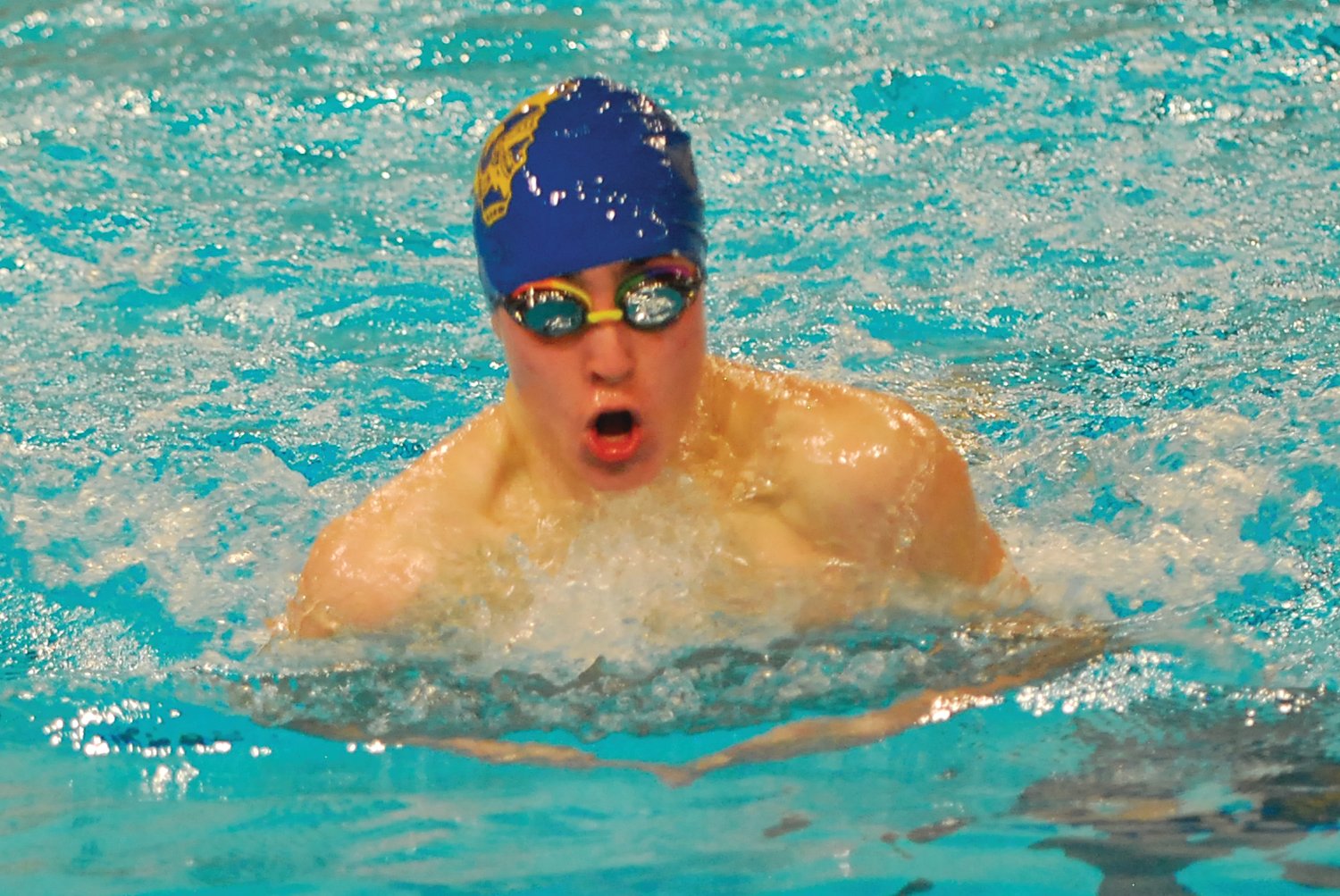 Crawfordsville's Marshall Horton swims to a win in the 100 breaststroke.