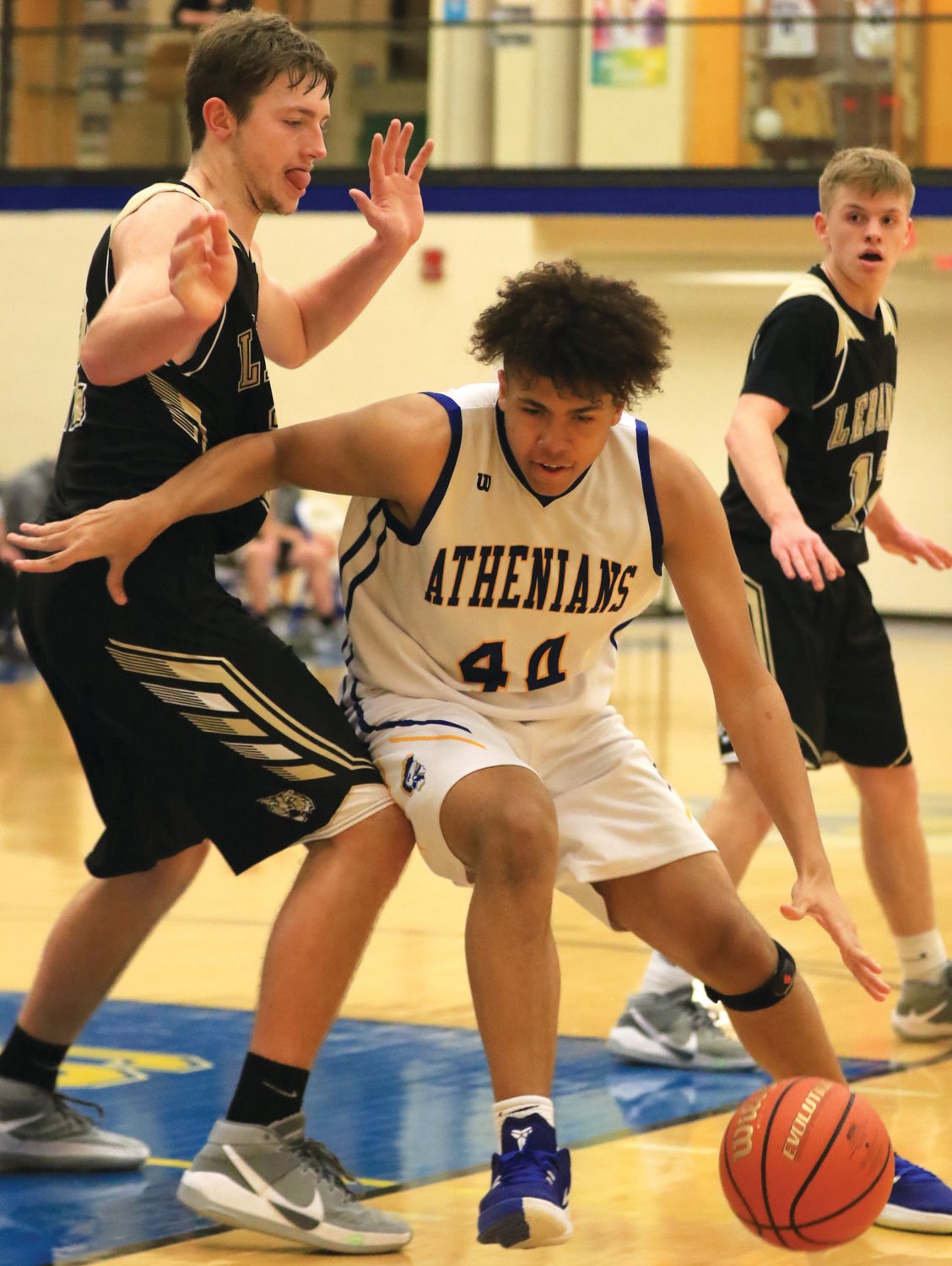 Crawfordsville’s Mekhi Wallace led the Athenians with six crucial points in the fourth quarter on their way to a 49-38 win over Lebanon.
