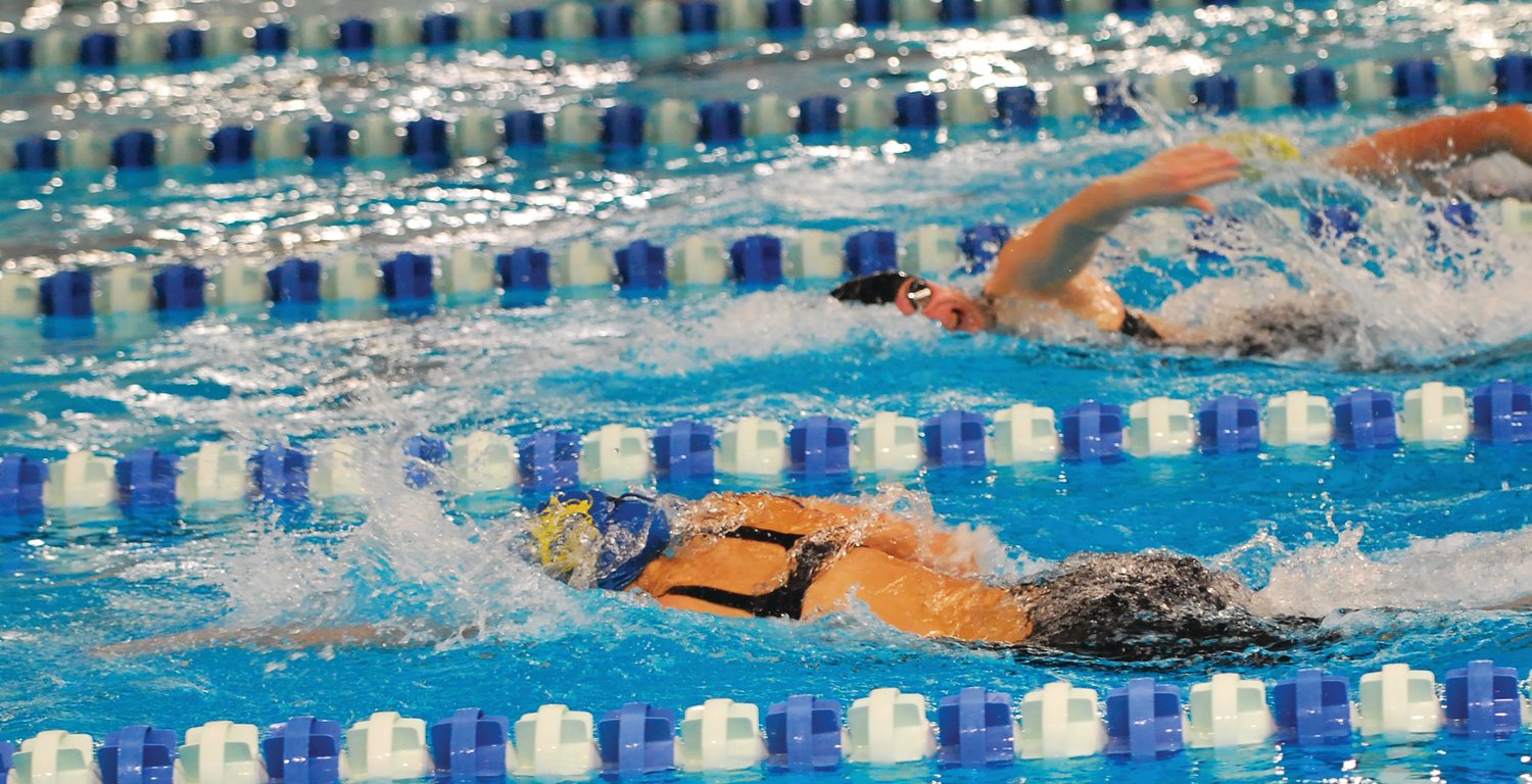 Crawfordsville's Alyx Bannon and North Montgomery's Sidney Campbell compete in the 100 freestyle earlier this season at the Sagamore Conference meet.