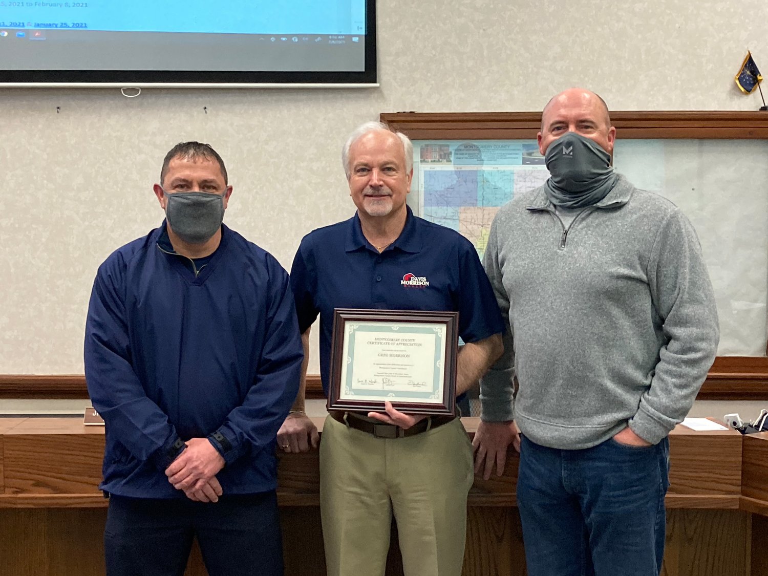 Former Montgomery County Councilman Greg Morrison, center, accepts a certificate of appreciation from the Board of Commissioners. Also pictured are commissioners Jim Fulwider and Dan Guard. The commissioners recognized Morrison and former Montgomery Superior Court 2 Judge Peggy Lohorn for their service to the county.