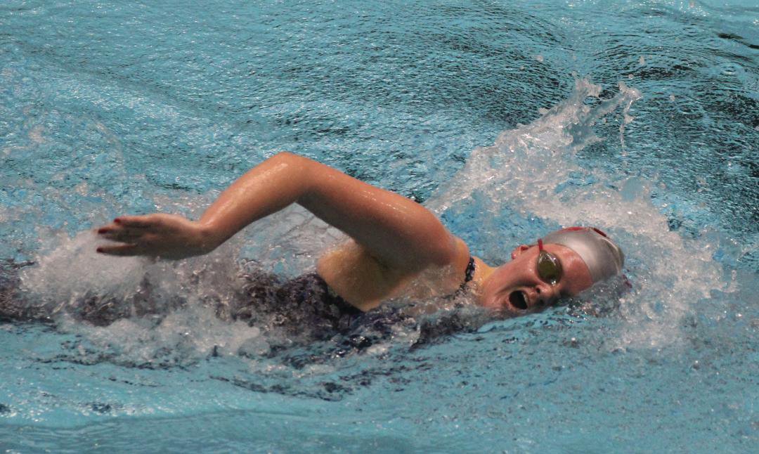Southmont's Megan Scheidler competes in the 500 freestyle in her final event as a Mountie swimmer on Friday night at the state finals.