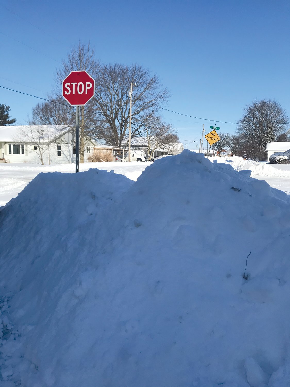 Snow piled up at an intersection in New Market on Tuesday.