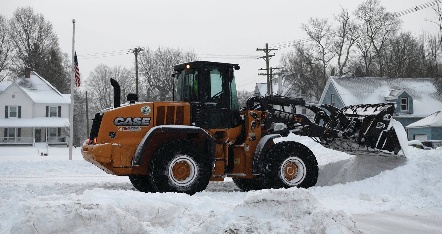 John and Terri Gadd captured city crews clearing snow in the 500 block of South Washington Street on Tuesday morning.