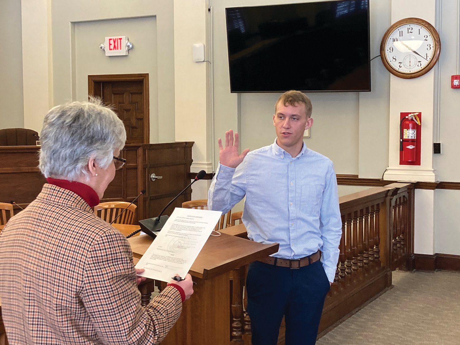 Newly-hired Crawfordsville Police Officer Judson Grubbs takes the oath from Clerk-Treasurer Terri Gadd in the City Building Wednesday. Grubb is beginning his law enforcement career in Crawfordsville.