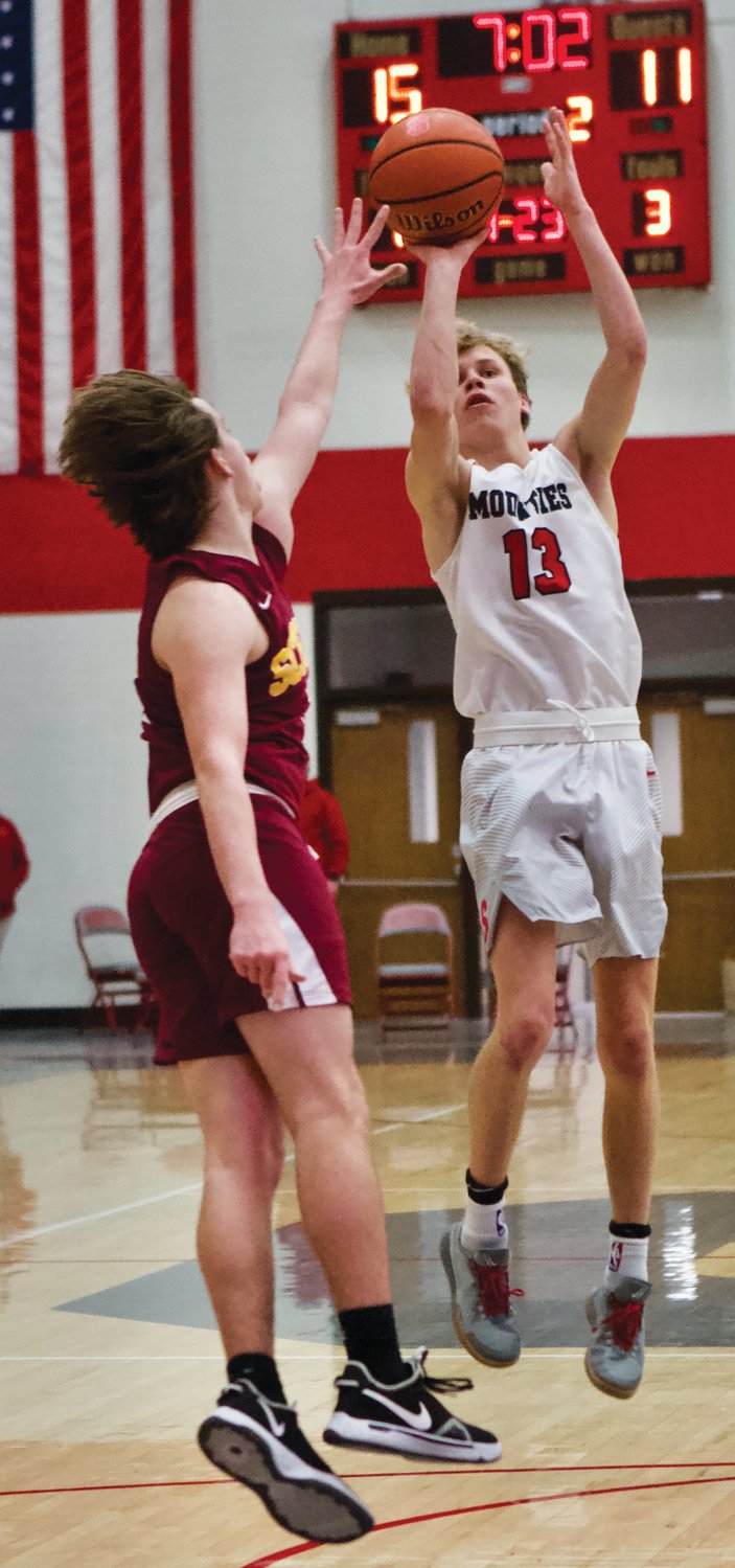 Southmont's Cale Hess pulls up a shot from the right elbow on Friday night against Indianapolis Scecina.