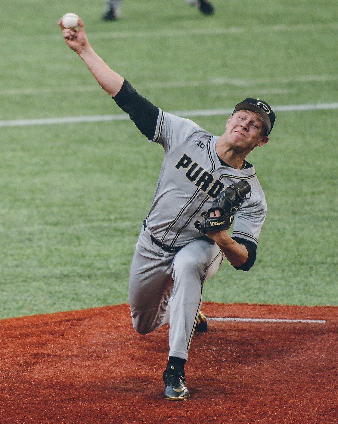 Crawfordsville’s Trent Johnson fires a pitch to the plate in a game early last season for Purdue University. Johnson is entering his senior season for the Boilermakers.
