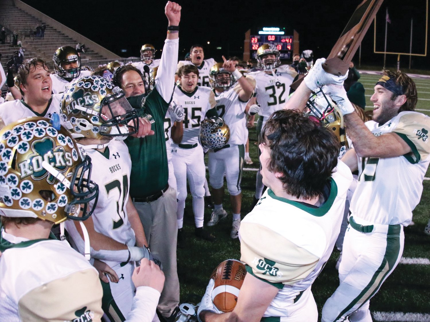 Westfield coach Jake Gilbert celebrates with his team after the Shamrocks clinched their third semi-state title in eight years last fall with a 41-23 win at Merrillville.  Gilbert started his coaching career at North Montgomery and spent time at Wabash College as an assistant coach.
