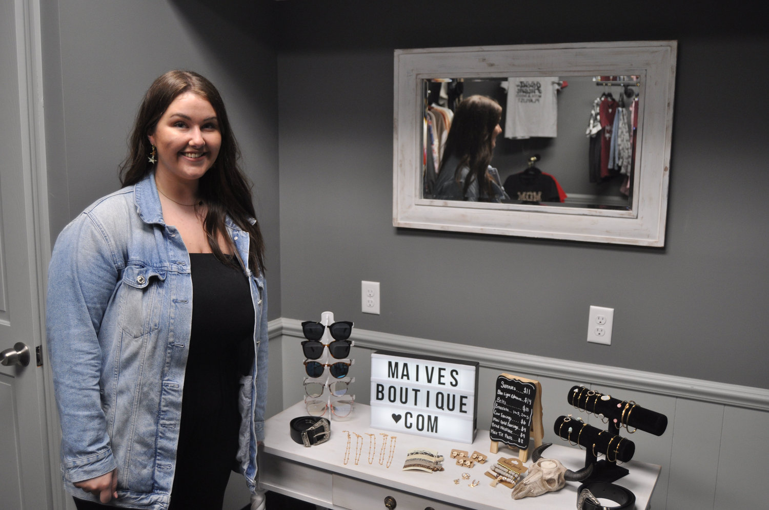 Lilly Wallace stands in her business Maive’s Boutique in the Weemickle Building in downtown Crawfordsville. Wallace shares the building with Demi Haas’s beauty establishment djh esthetics and brows.