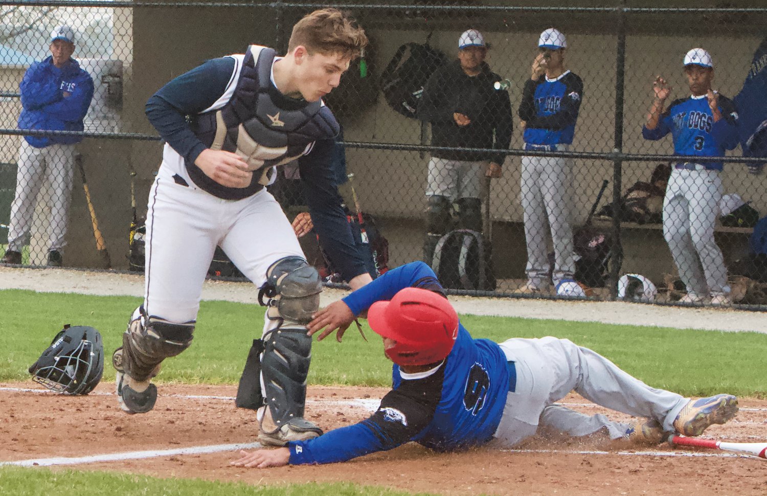 North Montgomery's Jacob Braun tags out a Frankfort player trying to score back in 2019.