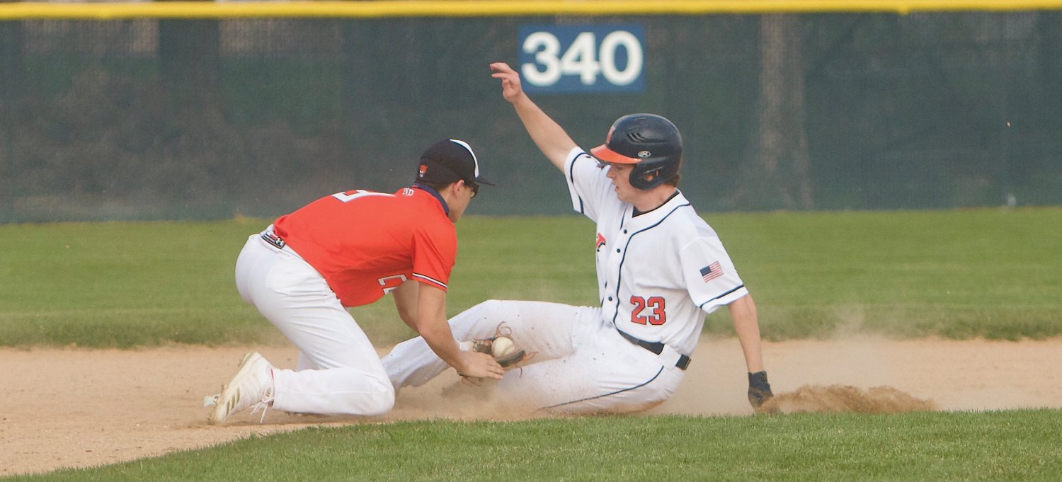 North Montgomery's Brookes Walters steals second-base.