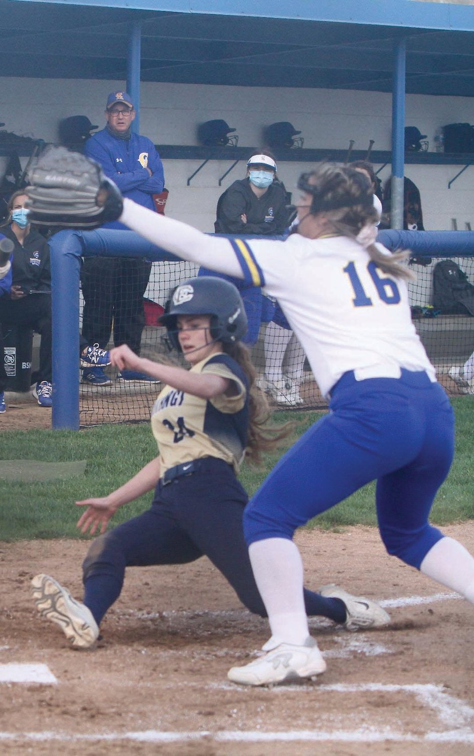 Fountain Central's Jerzi Hershberger slides safely into home plate in the Mustangs win at Crawfordsville on Thursday.