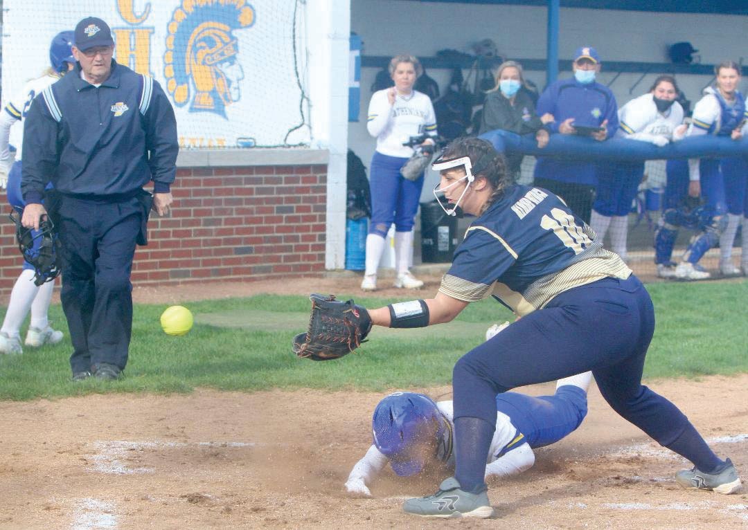 A bang-bang play at the plate on Thursday night between Crawfordsville and Fountain Central in softball.
