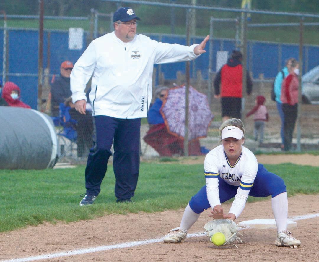 Crawfordsville's Olivia Reed fields a grounder at third-base on Thursday.