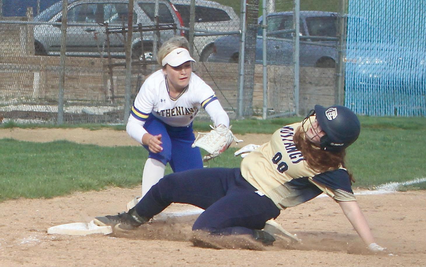 Crawfordsville's Olivia Reed applies a tag on a Fountain Central baserunner on Thursday.