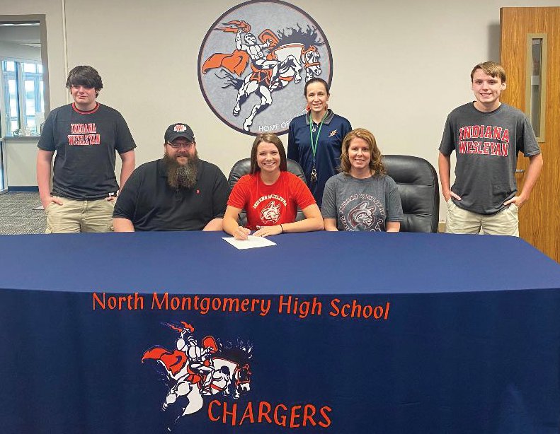 North Montgomery senior Sidney Campbell will continue her swimming and academic careers at Indiana Wesleyan this fall.  She is joined by her brothers, Colin and Wil Campbell, parents, Jon and Martha Campbell, and North Montgomery swimming and diving coach Erin Yeager.
