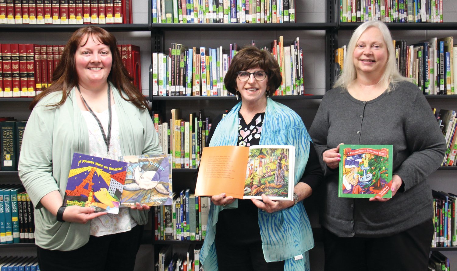 Pictured are Jennifer Schlatter, NCP media specialist; Connie McClure, PHMS art teacher; and Vicki Harbison, PHMS media assistant.