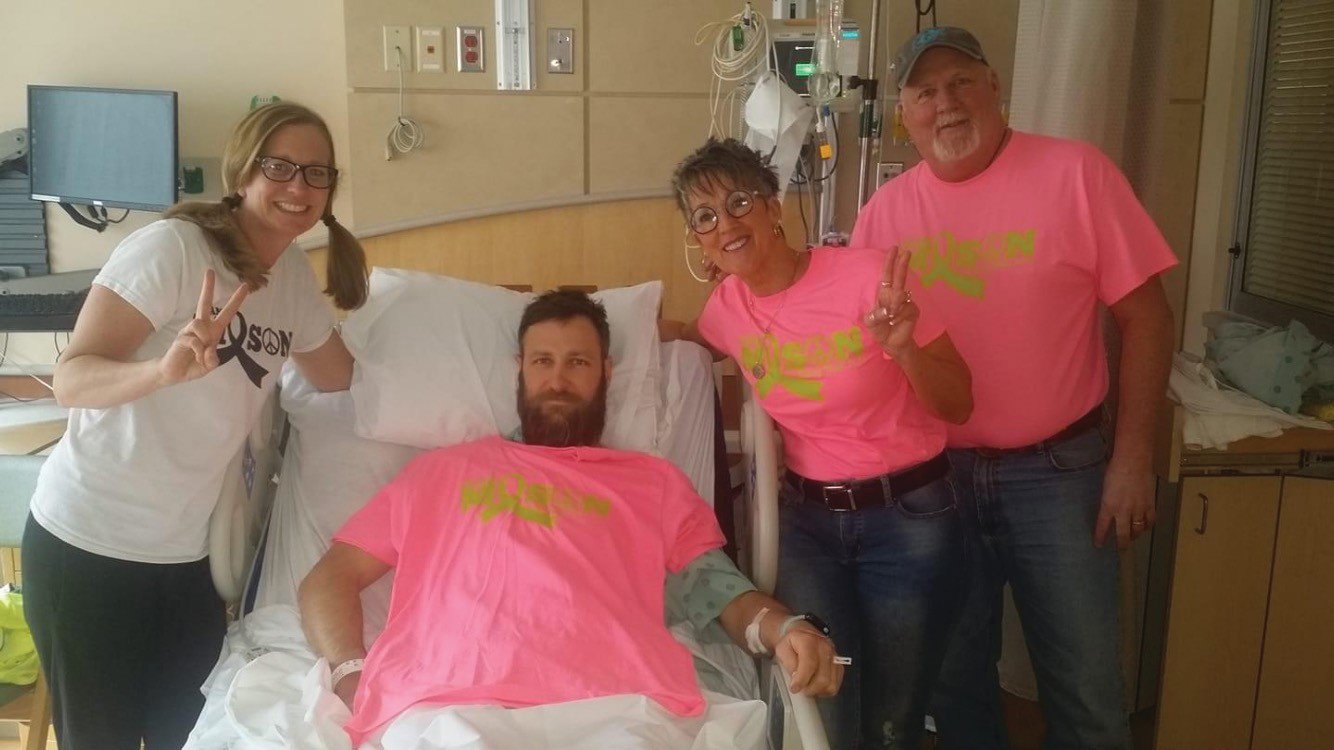 David McCartney, center, became an altruistic kidney donor in 2019, meaning he doesn’t know who received his organ. McCartney is show in his hospital room with wife, Kelly, and Team Mason’s Denise and Mark Patton.