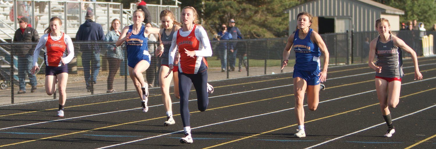 North Montgomery's Grace McClaskey won the 100 and 200 meter dash and helped the Chargers to a win in the 4X400 meter relay.
