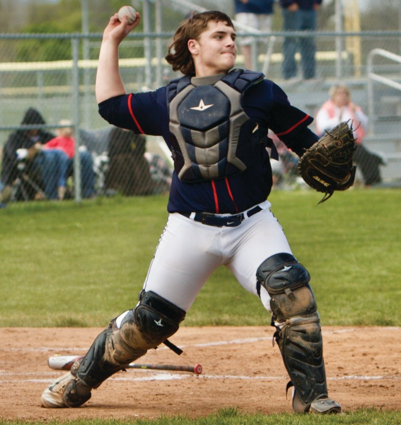 North Montgomery catcher Jacob Braun fires to a bas in a game earlier this season.