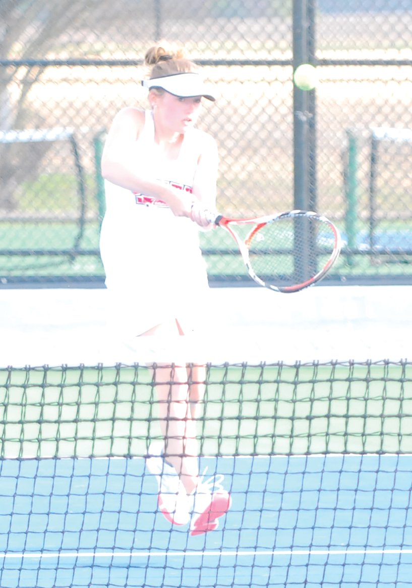 Southmont's Mallory Murphy returns a ball at No. 1 singles for the Mounties on Thursday night at North Montgomery.