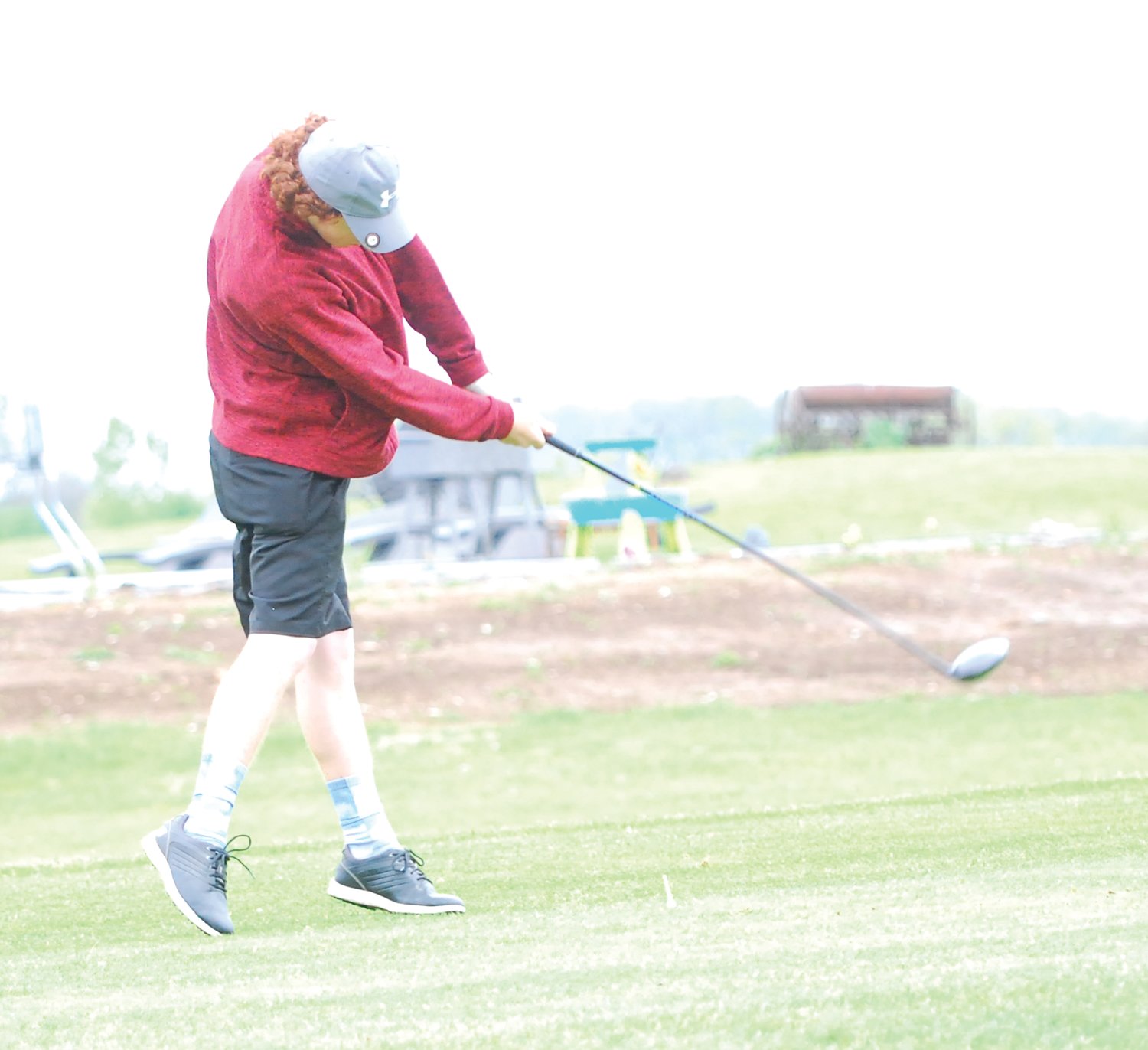 Southmont's Carson McKinney hits a tee shot on No. 14 at Rocky Ridge on Saturday.