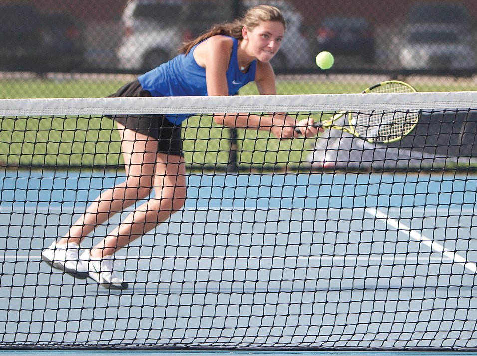 Crawfordsville's Cathleen McGrady returns a ball at No. 1 doubles.