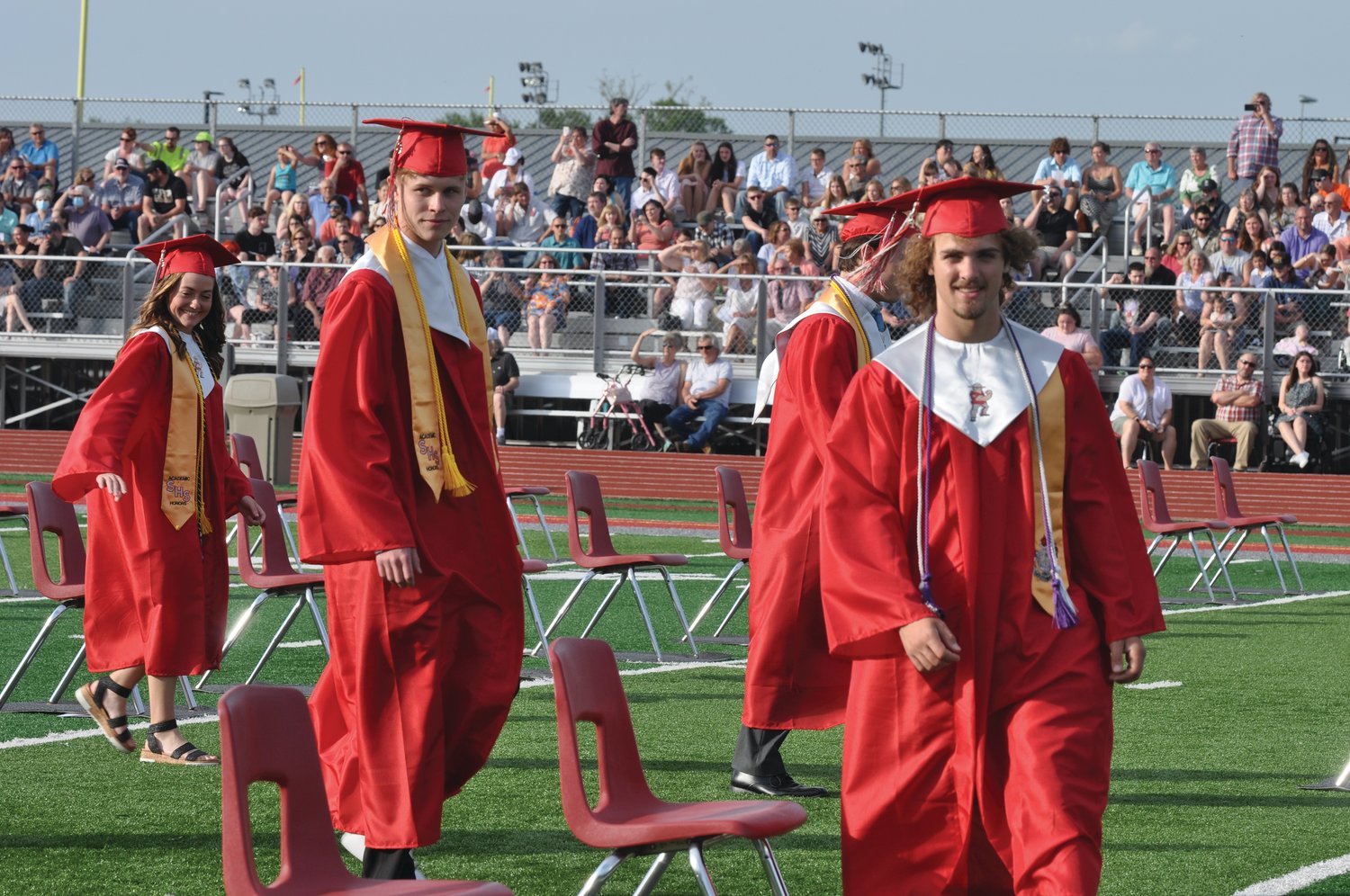 Soon-to-be graduates walk to their seats for commencement exercises at Southmont High School on Friday.