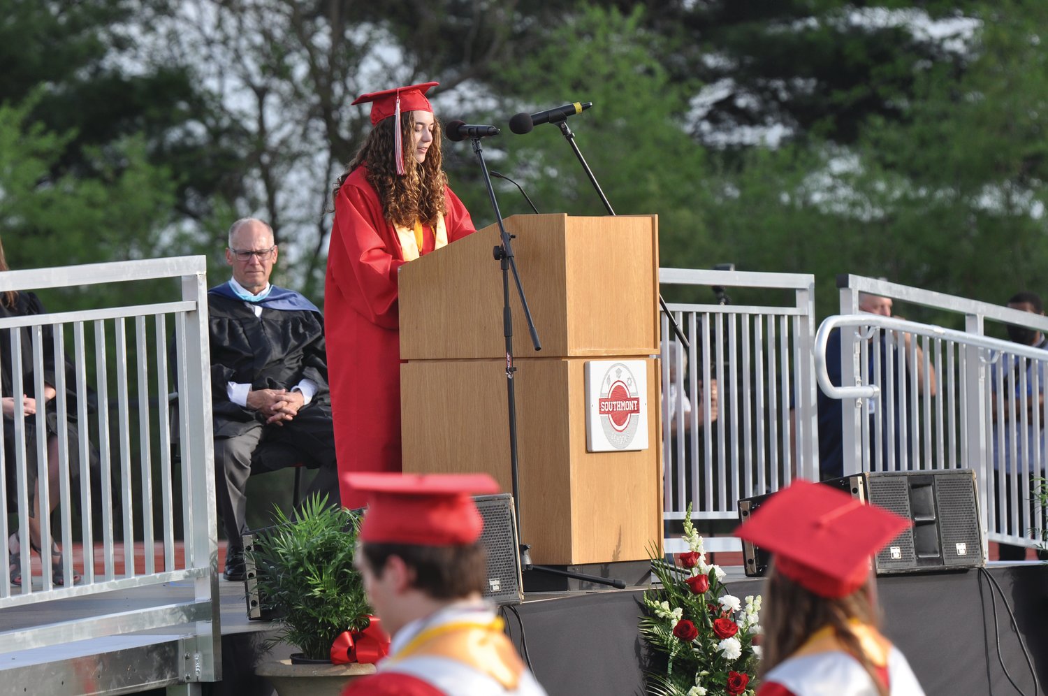 Salutatorian Lauren Tricker addresses her class during commencement exercises at Southmont High School on Friday.