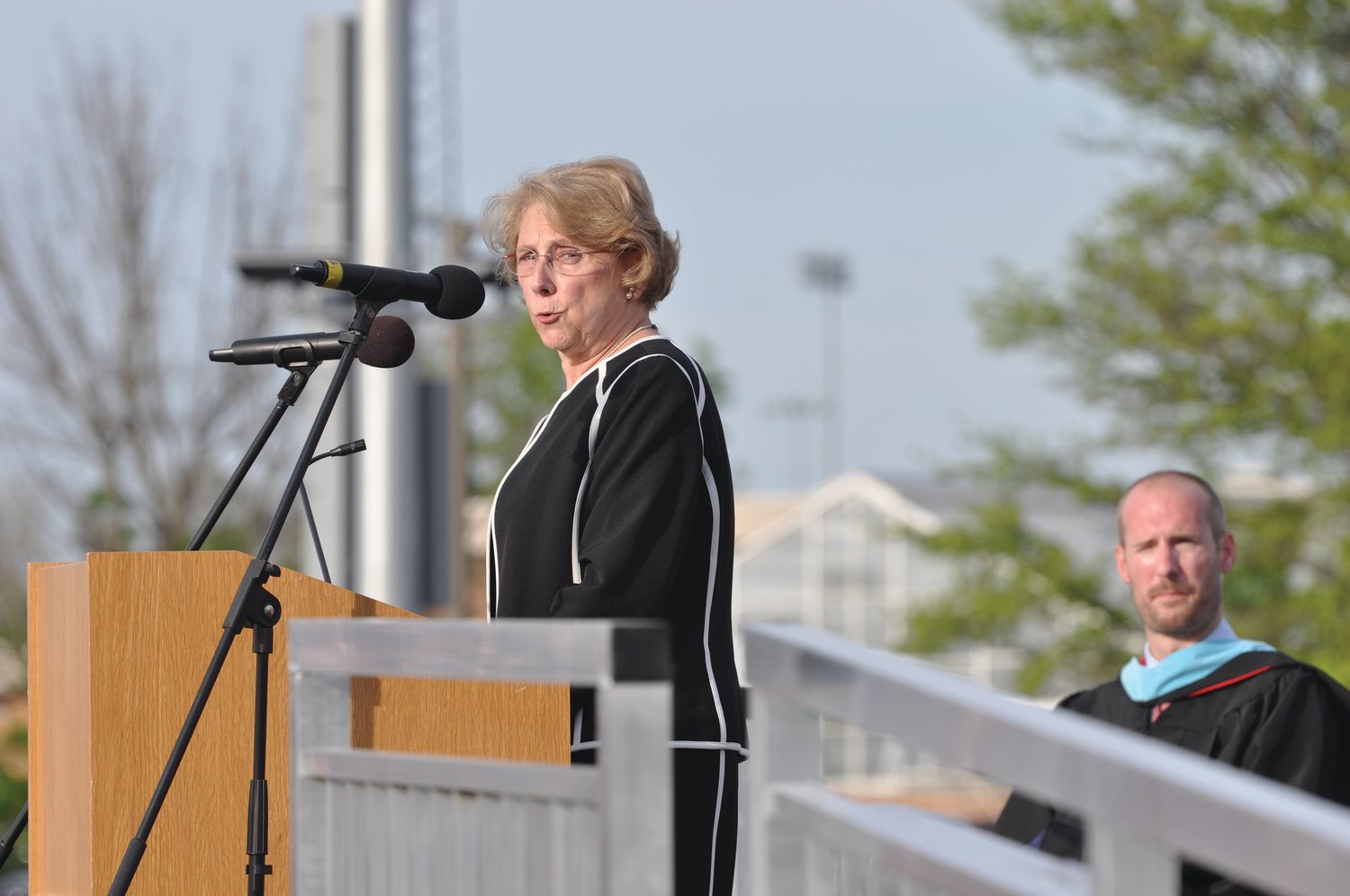 Retired Southmont High School teacher Jane Steiner addresses the Class of 2021 during commencement exercises at Mountie Stadium Friday. Steiner is an original faculty member of the school, which opened 50 years ago this fall.