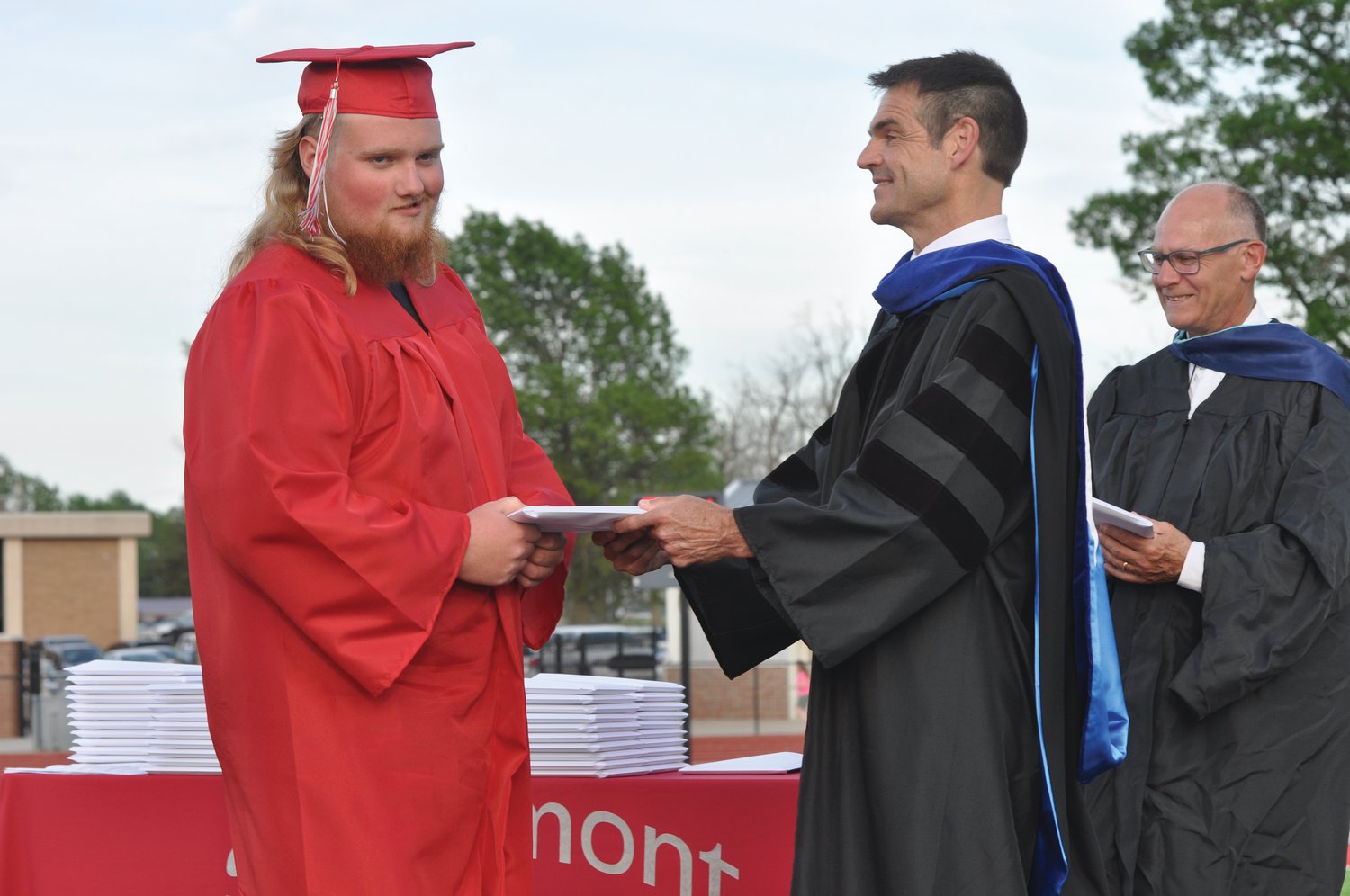 Drake Clore accepts his diploma from superintendent Dr. Shawn Greiner during commencement exercises at Southmont High School on Friday.