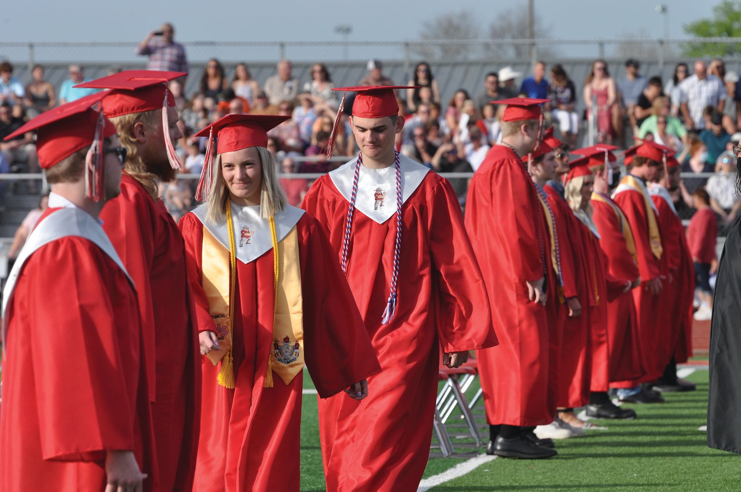 Graduating seniors walk to their seats for commencement exercises at Southmont High School.