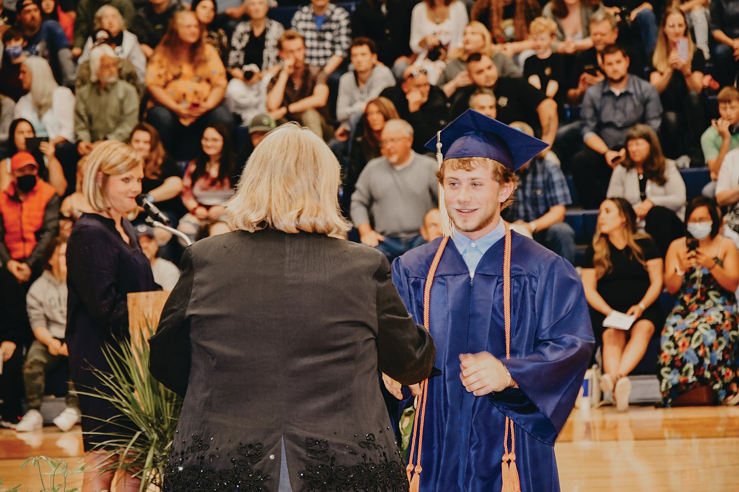 Brent Myers receives his diploma from Dr. Tania Grimes on Friday during commencement exercises at Fountain Central High School.