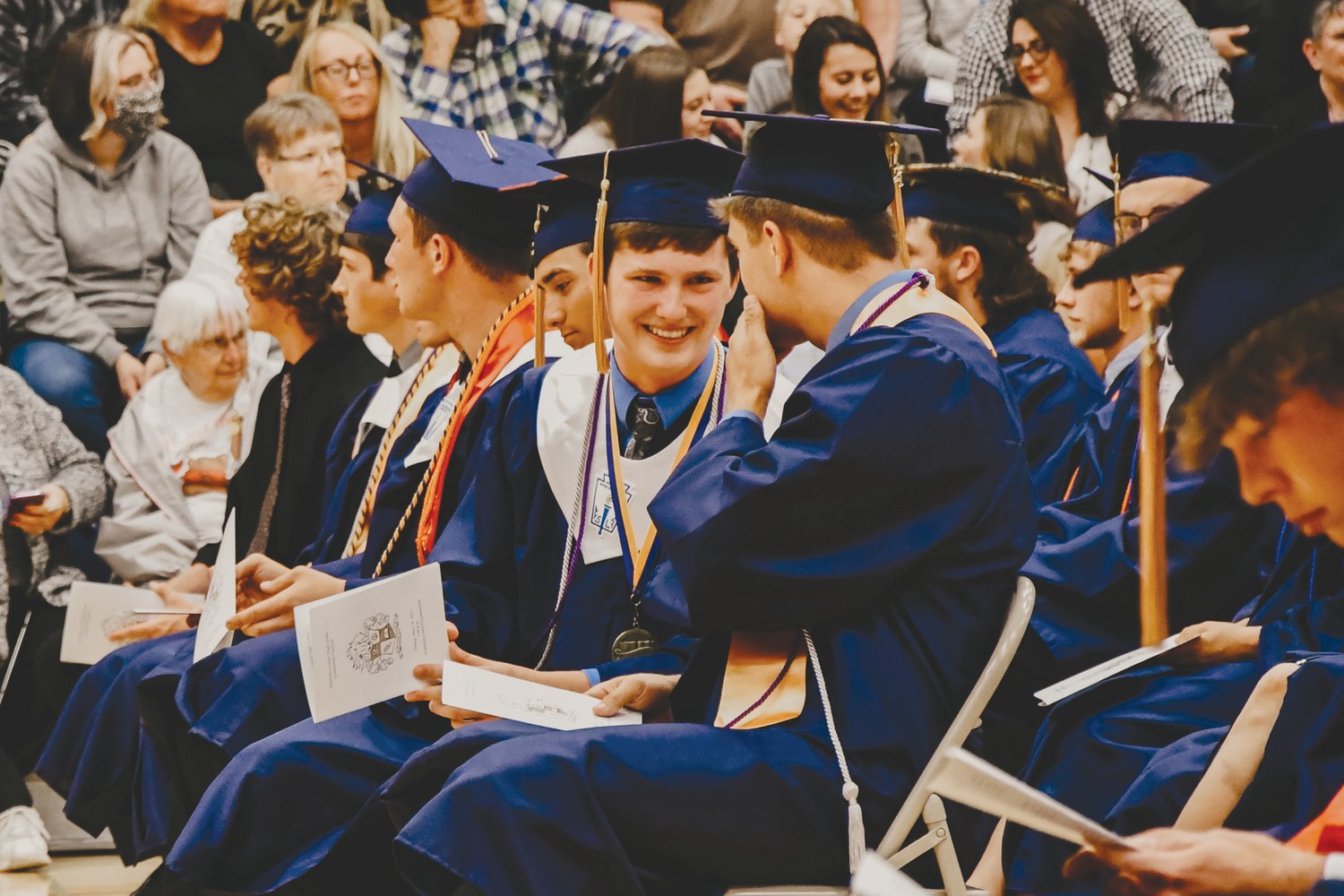 Sawyer Keeling, left, and Seth Gayler share a laugh during commencement Friday at Fountain Central High School.