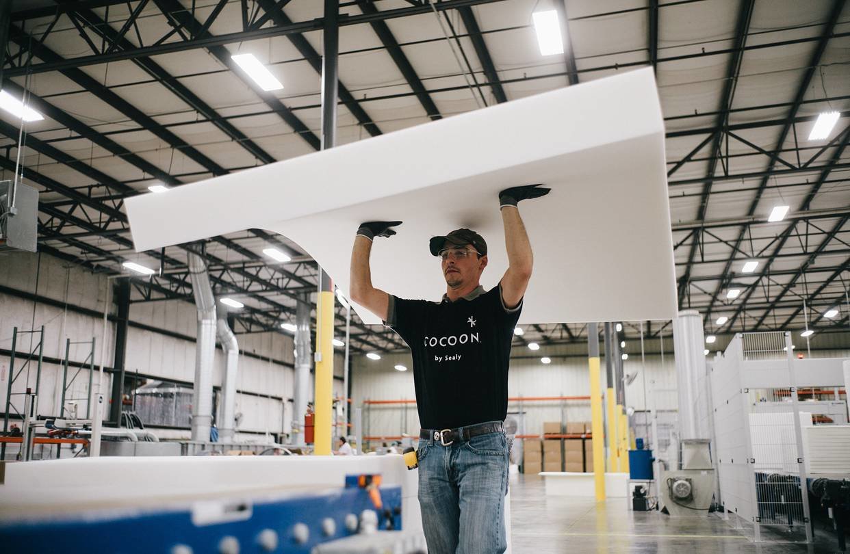 Foam sheets are prepared for assembly during production of the new Cocoon mattress line by Tempur Sealy. The company announced Monday its plans to build a manufacturing plant near Crawfordsville.