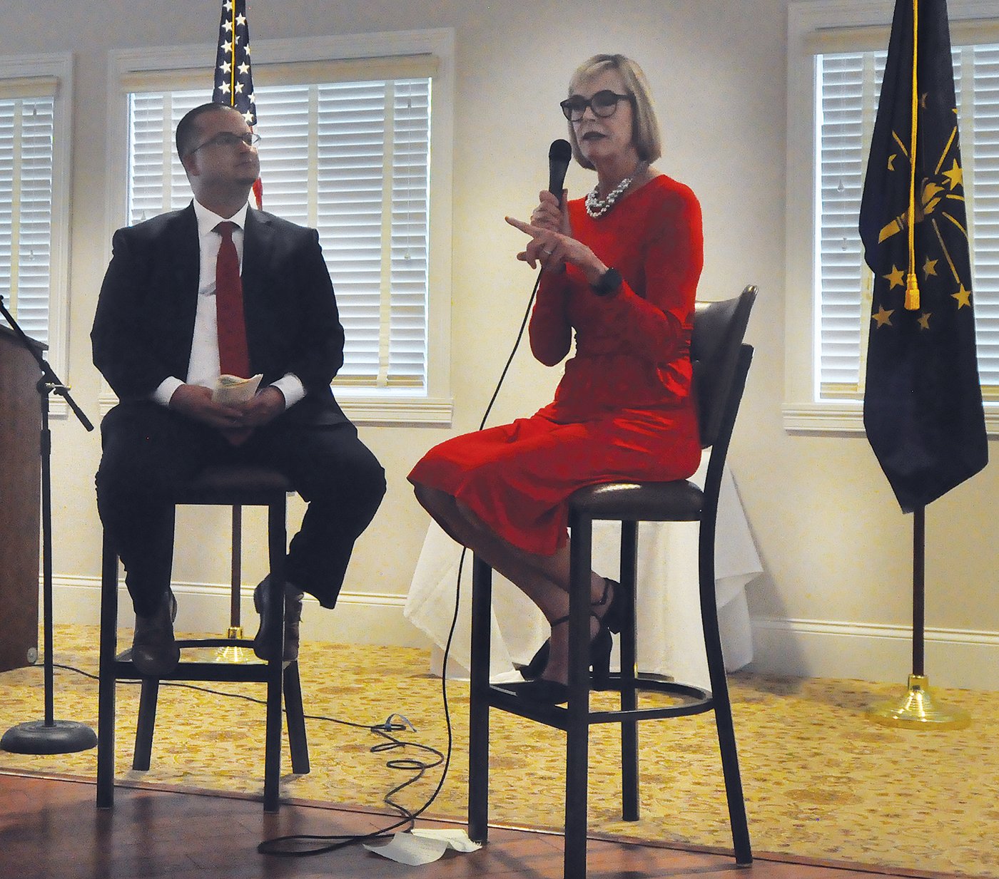 Lieutenant Governor Susan Crouch, right, speaks Tuesday to members of the Montgomery County Republican Party during the group’s annual dinner at the Crawfordsville Country Club. As part of her keynote address, Crouch participated in a question and answer session with Jim Johnson, left, the Montgomery County Republican Party chairman.