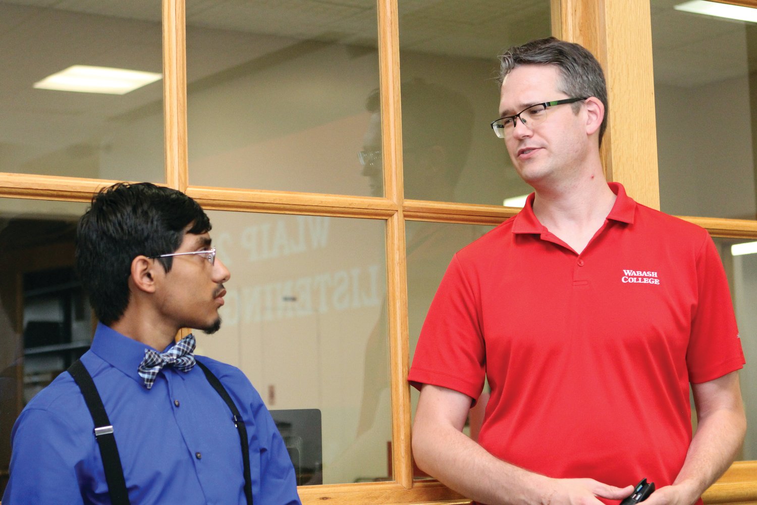 In this July 2018 photo, Jose Marquez '22, left, talks with Neil Schmitzer-Torbert, Associate Professor of Psychology, about what to expect when he arrives on campus in the fall.