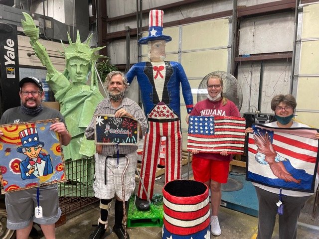 Abilities Services Inc. consumers pose with some of their artwork. The items will be on display and for sale at Athens Art Gallery beginning Friday. An artist reception is also planned 6-8 p.m. Friday at the local gallery