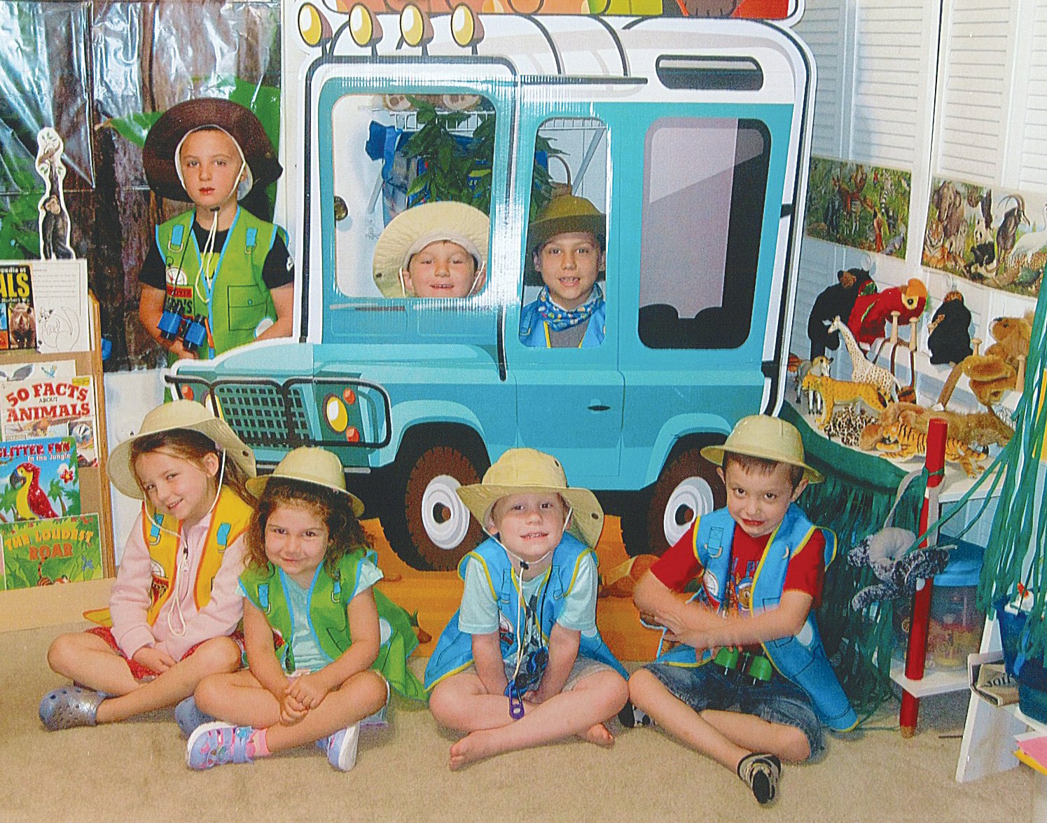 The students of Pattee Learning Center are pictured in their reading Jeep as they review and prepare a program for their parents on July 8. They all enjoyed a four-week study of the jungle and animals of the forest. Each of the students were able to improve their reading skills during this experience. Mrs. Pat Harwood announced the fall read enrollment will begin Aug. 9. She works with each student individually to help them improve their reading skills. She works with children age five to fifth grade. Call 765-362-3625 for more information. Pictured in the Jeep are Carter Bokhart, Reid Gerold and Jameson Whitecotton. Pictured outside the Jeep are Elizabeth Ryker, Delaney Whitecotton, Michael Nunan and Ezra Mortoura. Not pictured are Fletcher Petrie and Wyatt Pickett.