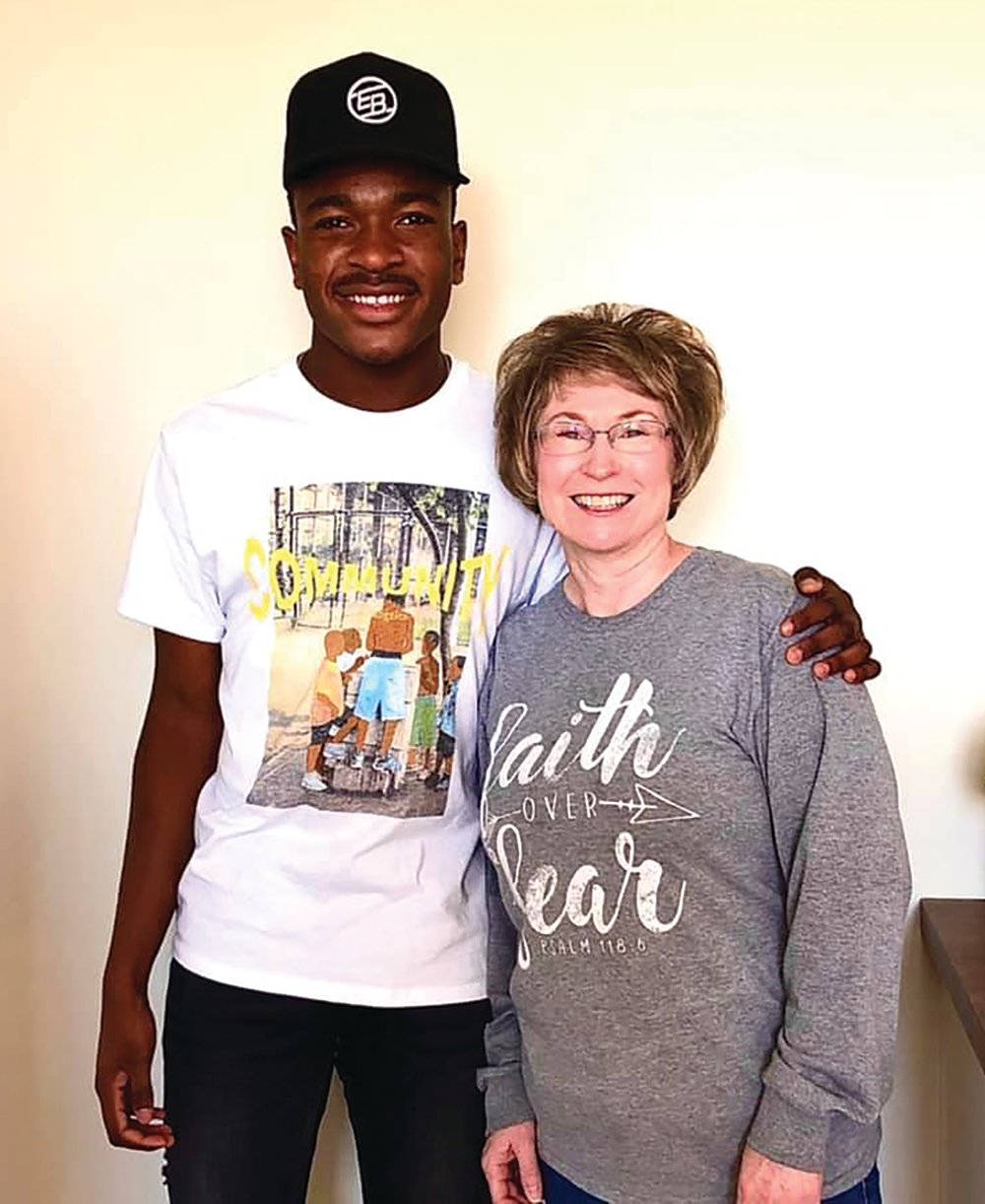 Emmett Bowman, left, poses with Susan Zachary, executive director of Pam’s Promise. Bowman has donated some of the proceeds from the sale of his clothing brand to the local transitional housing organization.