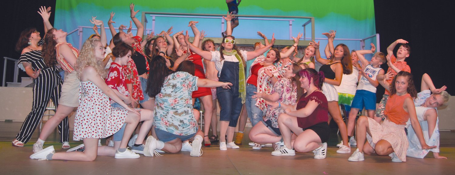 Cast members rehearse the musical romantic comedy, Mamma Mia!, on Wednesday on the North Montgomery High School stage. The show continues daily through Sunday.