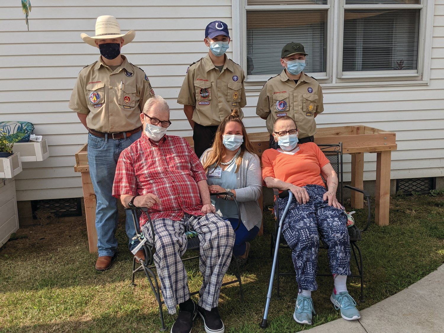 Members of Scouts BSA Troop 309 delivered the raised beds to Ben Hur Health & Rehabilitation Saturday. First row from left are Norman Early, Brooke Brown and Lou Early. Top row are  Trae Hunt, Lucas Spears and Logan Spears.