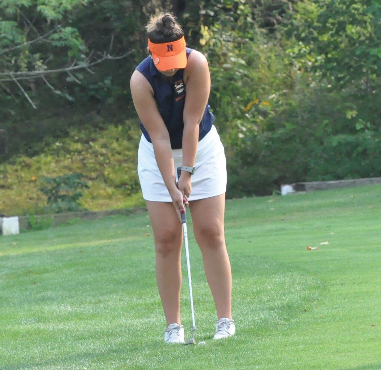 North Montgomery's Rylie Koopman lines up a putt on No. 3 at Rocky Ridge on Monday.